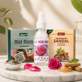 Tibbi rose water bottle with sandalwood powder and mud mask packaging on a marble surface.